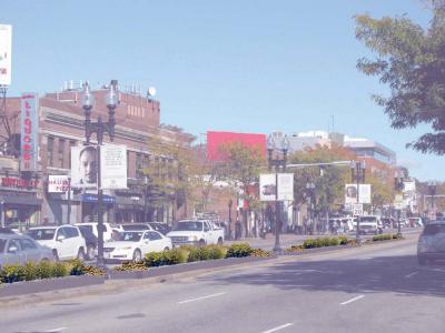 A rendering shows how the median strip along Blue Hill Avenue might be enhanced as part of a state-funded renovation in Mattapan Square. 	Image courtesy City of Boston